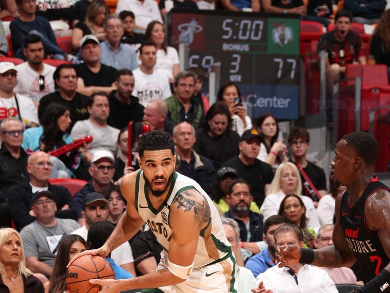 MIAMI, FL - FEBRUARY 11: Jayson Tatum #0 of the Boston Celtics handles the ball during the game against the Miami Heat on February 11, 2024 at Kaseya Center in Miami, Florida. NOTE TO USER: User expressly acknowledges and agrees that, by downloading and or using this Photograph, user is consenting to the terms and conditions of the Getty Images License Agreement. Mandatory Copyright Notice: Copyright 2024 NBAE (Photo by Issac Baldizon/NBAE via Getty Images)