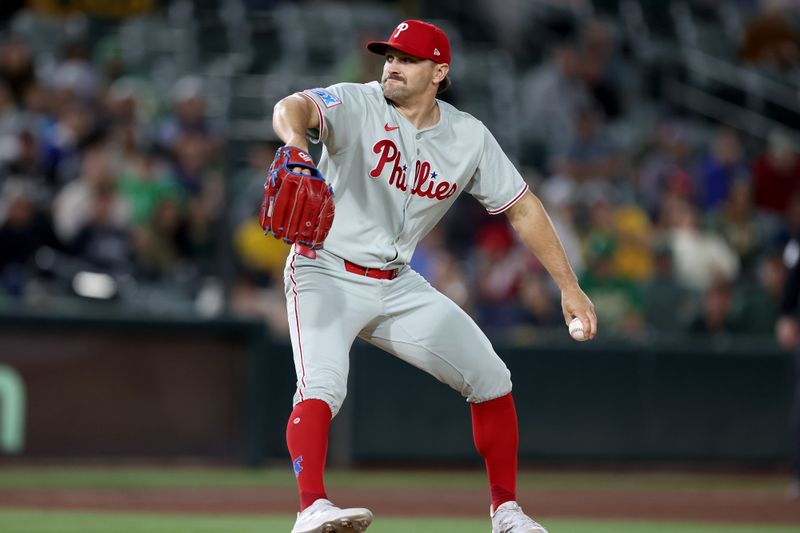 May 24, 2025; West Sacramento, California, USA; Philadelphia Phillies pitcher Tanner Banks (58) throws a pitch against the Athletics during the ninth inning at Sutter Health Park. Mandatory Credit: Dennis Lee-Imagn Images