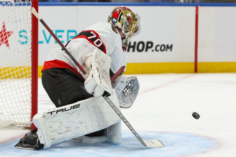 Mar 16, 2024; Elmont, New York, USA;  Ottawa Senators goaltender Joonas Korpisalo (70) makes a save against New York Islanders during the second period at UBS Arena. Mandatory Credit: Thomas Salus-USA TODAY Sports