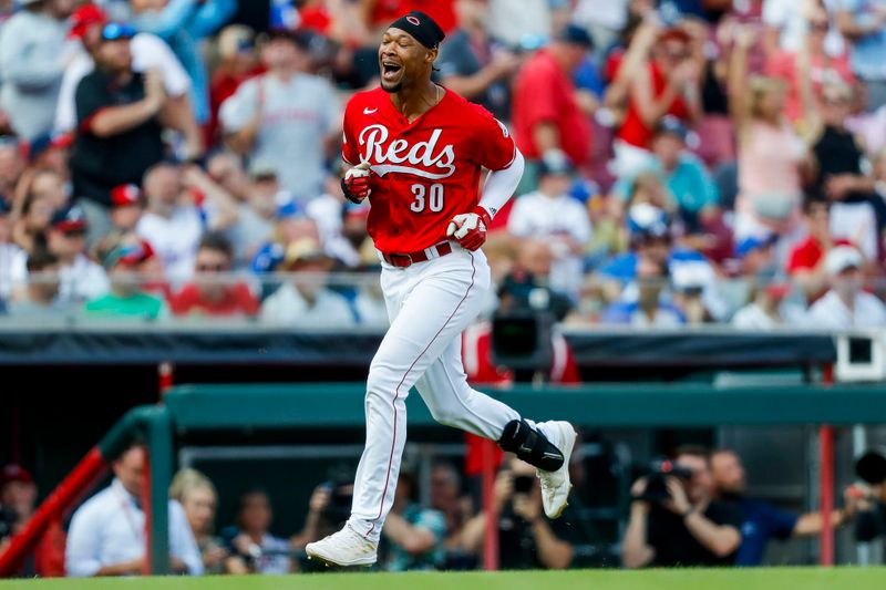 Jun 24, 2023; Cincinnati, Ohio, USA; Cincinnati Reds pinch hitter Will Benson (30) celebrates after hitting a solo home run in the ninth inning against the Atlanta Braves at Great American Ball Park. Mandatory Credit: Katie Stratman-USA TODAY Sports