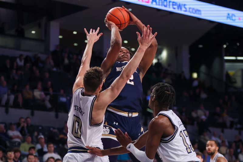 Feb 8, 2023; Atlanta, Georgia, USA; Notre Dame Fighting Irish forward Ven-Allen Lubin (2) shoots over Georgia Tech Yellow Jackets guard Lance Terry (0) in the first half at McCamish Pavilion. Mandatory Credit: Brett Davis-USA TODAY Sports