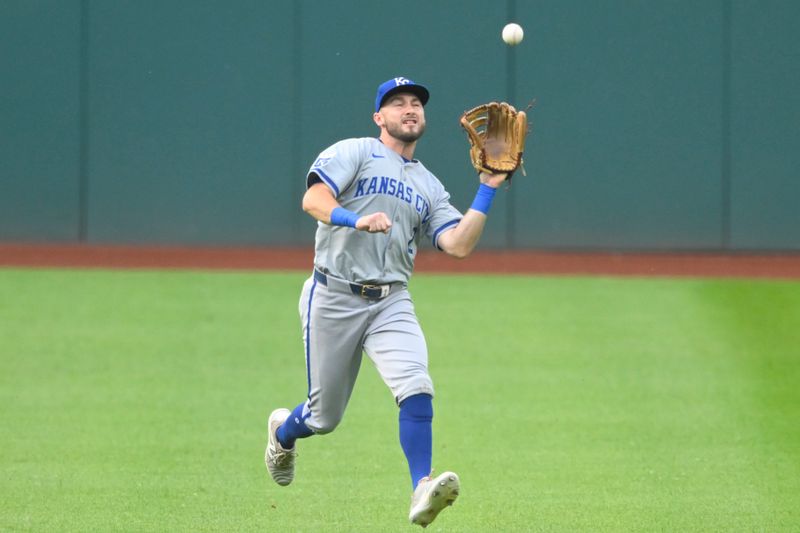 Jun 4, 2024; Cleveland, Ohio, USA; Kansas City Royals center fielder Garrett Hampson (2) makes a catch in the first inning against the Cleveland Guardians at Progressive Field. Mandatory Credit: David Richard-USA TODAY Sports