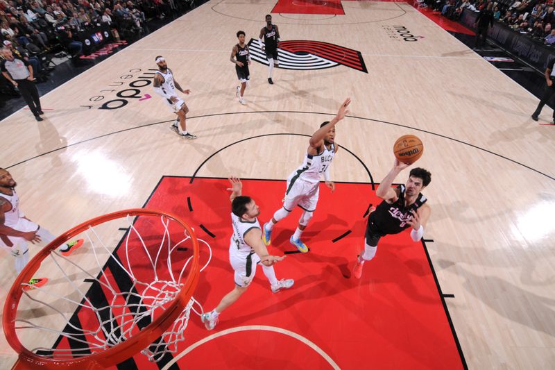 PORTLAND, OR - JANUARY 28: Deni Avdija #8 of the Portland Trail Blazers shoots the ball during the game against the Milwaukee Bucks on January 28, 2025 at the Moda Center Arena in Portland, Oregon. NOTE TO USER: User expressly acknowledges and agrees that, by downloading and or using this photograph, user is consenting to the terms and conditions of the Getty Images License Agreement. Mandatory Copyright Notice: Copyright 2025 NBAE (Photo by Cameron Browne/NBAE via Getty Images)