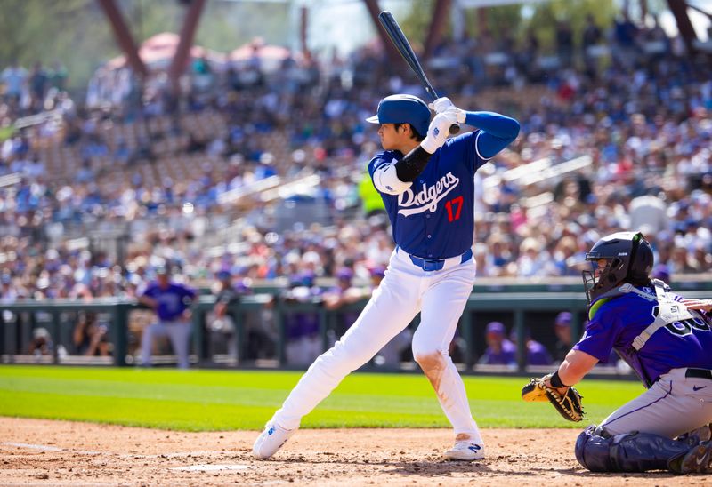 Mar 3, 2024; Phoenix, Arizona, USA; Los Angeles Dodgers designated hitter Shohei Ohtani against the Colorado Rockies during a spring training game at Camelback Ranch-Glendale. Mandatory Credit: Mark J. Rebilas-USA TODAY Sports