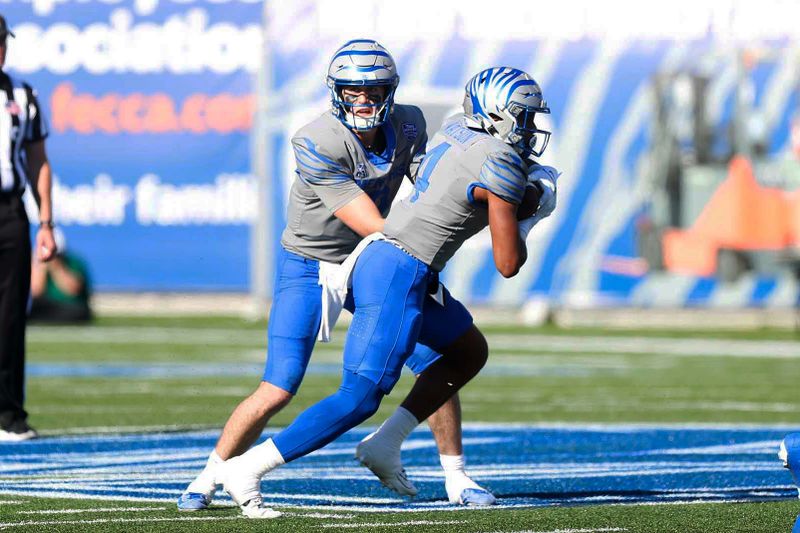 Nov 4, 2023; Memphis, Tennessee, USA;  Memphis Tigers  Blake Watson (4) runs the ball up the field against South Florida  at Simmons Bank Liberty Stadium. Mandatory Credit: Stu Boyd II-USA TODAY Sports