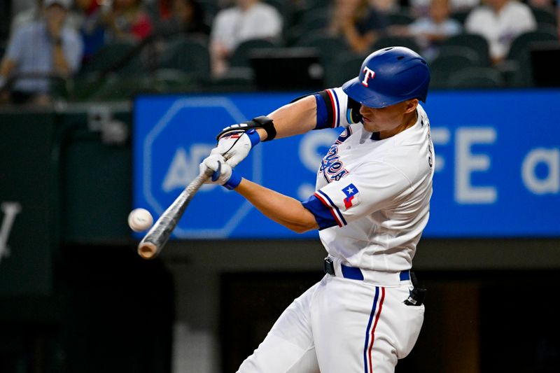 Aug 3, 2023; Arlington, Texas, USA; Texas Rangers designated hitter Corey Seagar (5) bats against the Chicago White Sox during the third inning at Globe Life Field. Mandatory Credit: Jerome Miron-USA TODAY Sports