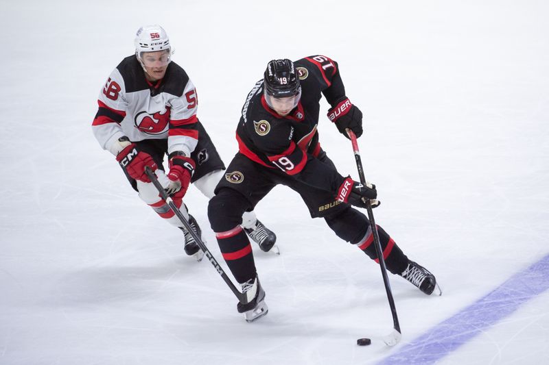 Apr 6, 2024; Ottawa, Ontario, CAN; Ottawa Senators right wing Drake Batherson (19) skates with the puck in front of New Jersey Devils left wing Erik Haula (56) in the third period at the Canadian Tire Centre. Mandatory Credit: Marc DesRosiers-USA TODAY Sports