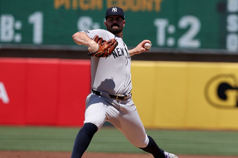 May 10, 2025; West Sacramento, California, USA; New York Yankees starting pitcher Carlos Rodon (55) throws a pitch against the Athletics during the first inning at Sutter Health Park. Mandatory Credit: Dennis Lee-Imagn Images