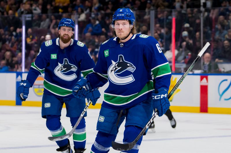 Feb 27, 2024; Vancouver, British Columbia, CAN; Vancouver Canucks defenseman Filip Hronek (17) and forward Brock Boeser (6) celebrate Boeser   s goal against the Pittsburgh Penguins in the first period at Rogers Arena. Mandatory Credit: Bob Frid-USA TODAY Sports