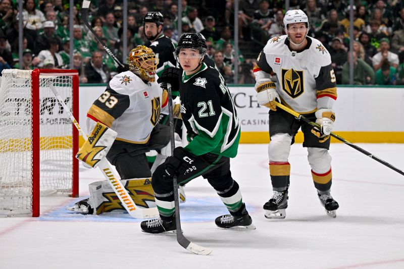 Mar 22, 2026; Dallas, Texas, USA; Dallas Stars left wing Jason Robertson (21) skates in front of Vegas Golden Knights goaltender Adin Hill (33) and defenseman Jeremy Lauzon (5) during the second period at the American Airlines Center. Mandatory Credit: Jerome Miron-Imagn Images Mar 22, 2026; Dallas, Texas, USA; Dallas Stars left wing Jason Robertson (21) skates in front of Vegas Golden Knights goaltender Adin Hill (33) and defenseman Jeremy Lauzon (5) during the second period at the American Airlines Center. Mandatory Credit: Jerome Miron-Imagn Images
