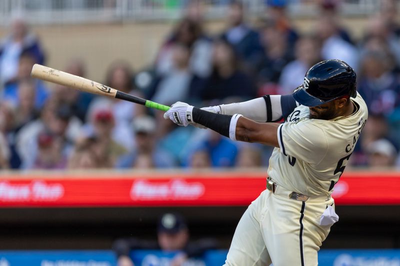 May 29, 2024; Minneapolis, Minnesota, USA; Minnesota Twins center fielder Willi Castro (50) hits a double against the Kansas City Royals in the second inning at Target Field. Mandatory Credit: Jesse Johnson-USA TODAY Sports