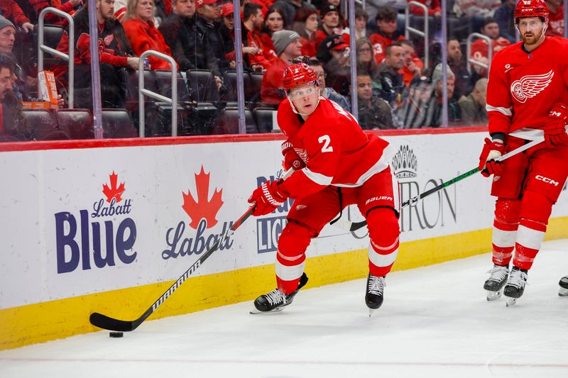 Mar 19, 2024; Detroit, Michigan, USA; Detroit Red Wings defenseman Olli Maatta (2) handles the puck during the third period of the game against the Columbus Blue Jackets at Little Caesars Arena. Mandatory Credit: Brian Bradshaw Sevald-USA TODAY Sports