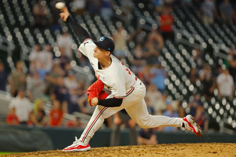 Jun 16, 2024; Minneapolis, Minnesota, USA; Minnesota Twins relief pitcher Griffin Jax (22) throws to the Oakland Athletics in the ninth inning of game two of a double header at Target Field. Mandatory Credit: Bruce Kluckhohn-USA TODAY Sports