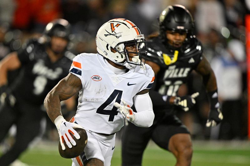 Nov 9, 2023; Louisville, Kentucky, USA; Virginia Cavaliers wide receiver Malik Washington (4) runs the ball against the Louisville Cardinals during the first quarter at L&N Federal Credit Union Stadium. Mandatory Credit: Jamie Rhodes-USA TODAY Sports