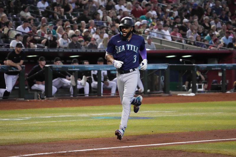 Jul 30, 2023; Phoenix, Arizona, USA; Seattle Mariners shortstop J.P. Crawford (3) runs the bases after hitting a solo home run against the Arizona Diamondbacks during the second inning at Chase Field. Mandatory Credit: Joe Camporeale-USA TODAY Sports
