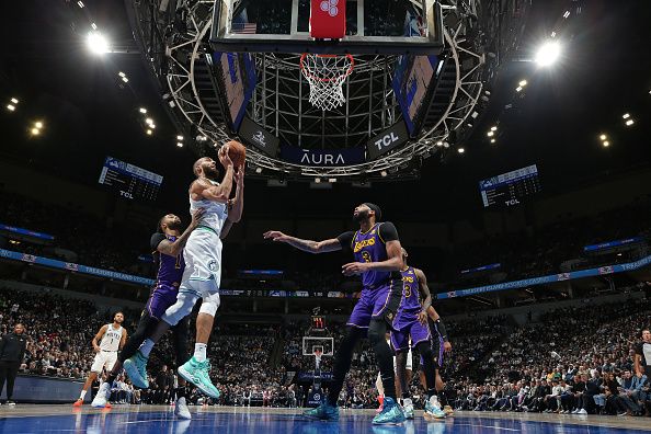 MINNEAPOLIS, MN -  DECEMBER 30: Rudy Gobert #27 of the Minnesota Timberwolves drives to the basket during the game against the Los Angeles Lakers on December 30, 2023 at Target Center in Minneapolis, Minnesota. NOTE TO USER: User expressly acknowledges and agrees that, by downloading and or using this Photograph, user is consenting to the terms and conditions of the Getty Images License Agreement. Mandatory Copyright Notice: Copyright 2023 NBAE (Photo by David Sherman/NBAE via Getty Images)