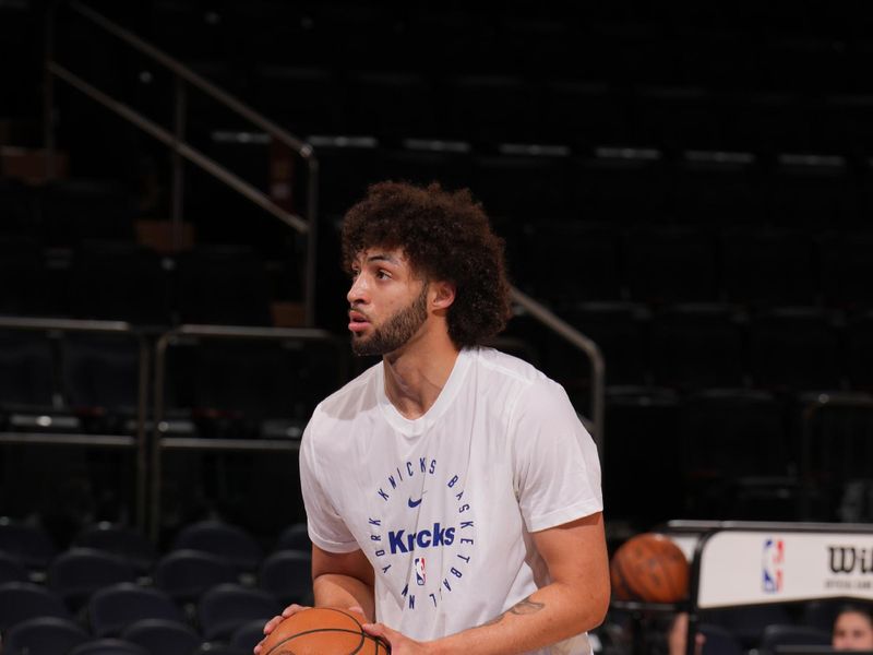 NEW YORK, NY - APRIL 1: Anton Watson #21 of the New York Knicks warms up before the game against the Philadelphia 76ers on April 1, 2025 at Madison Square Garden in New York City, New York.  NOTE TO USER: User expressly acknowledges and agrees that, by downloading and or using this photograph, User is consenting to the terms and conditions of the Getty Images License Agreement. Mandatory Copyright Notice: Copyright 2025 NBAE  (Photo by Jesse D. Garrabrant/NBAE via Getty Images)