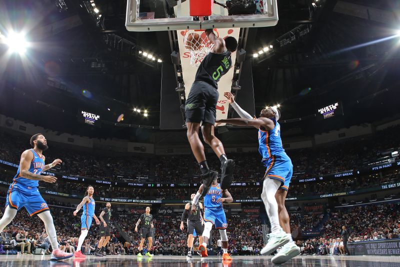 NEW ORLEANS, LA - JANUARY 26: Herb Jones #5 of the New Orleans Pelicans dunks the ball during the game against the Oklahoma City Thunder on January 26, 2024 at the Smoothie King Center in New Orleans, Louisiana. NOTE TO USER: User expressly acknowledges and agrees that, by downloading and or using this Photograph, user is consenting to the terms and conditions of the Getty Images License Agreement. Mandatory Copyright Notice: Copyright 2024 NBAE (Photo by Layne Murdoch Jr./NBAE via Getty Images)