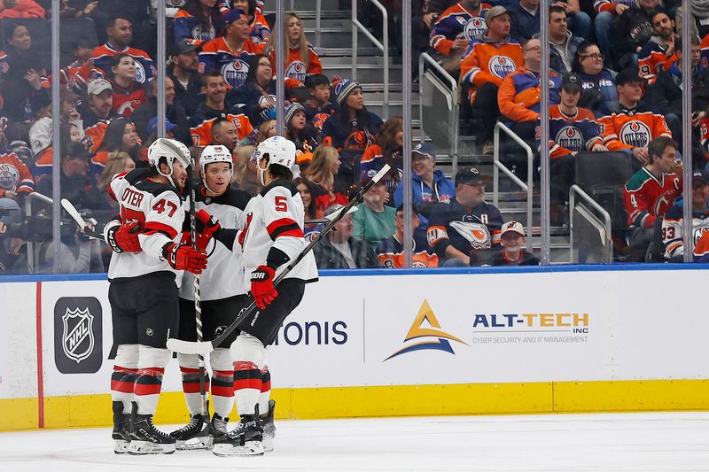 Nov 4, 2024; Edmonton, Alberta, CAN; The New Jersey Devils celebrate a goal by forward Stefan Noesen (11) during the first period against the Edmonton Oilers at Rogers Place. Mandatory Credit: Perry Nelson-Imagn Images