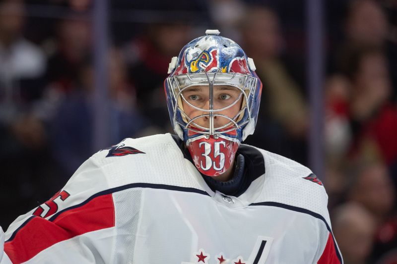 Oct 18, 2023; Ottawa, Ontario, CAN; Washington Capitals goalie Darcy Kuemper (35) looks on during a break in action in the fisrt period against the Ottawa Senators at the Canadian Tire Centre. Mandatory Credit: Marc DesRosiers-USA TODAY Sports