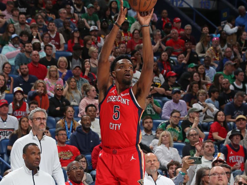 NEW ORLEANS, LA - MARCH 30: Herb Jones #5 of the New Orleans Pelicans three point basket during the game against the Boston Celtics on March 30, 2024 at the Smoothie King Center in New Orleans, Louisiana. NOTE TO USER: User expressly acknowledges and agrees that, by downloading and or using this Photograph, user is consenting to the terms and conditions of the Getty Images License Agreement. Mandatory Copyright Notice: Copyright 2024 NBAE (Photo by Layne Murdoch Jr./NBAE via Getty Images)