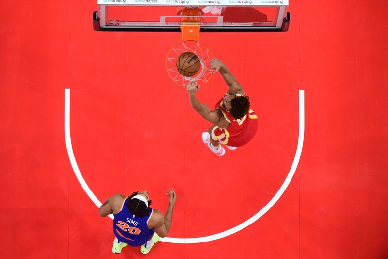 ATLANTA, GA - November 6:  Dyson Daniels #5 of the Atlanta Hawks dunks the ball during the game against the New York Knicks on November 6, 2024 at State Farm Arena in Atlanta, Georgia.  NOTE TO USER: User expressly acknowledges and agrees that, by downloading and/or using this Photograph, user is consenting to the terms and conditions of the Getty Images License Agreement. Mandatory Copyright Notice: Copyright 2024 NBAE (Photo by Adam Hagy/NBAE via Getty Images)