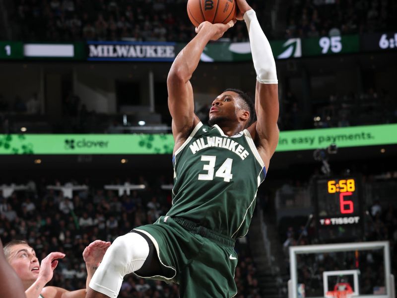 MILWAUKEE, WI - NOVEMBER 10: Giannis Antetokounmpo #34 of the Milwaukee Bucks shoots the ball during the game against the Boston Celtics on November 10, 2024 at the Fiserv Forum Center in Milwaukee, Wisconsin. NOTE TO USER: User expressly acknowledges and agrees that, by downloading and or using this Photograph, user is consenting to the terms and conditions of the Getty Images License Agreement. Mandatory Copyright Notice: Copyright 2024 NBAE (Photo by Gary Dineen/NBAE via Getty Images).