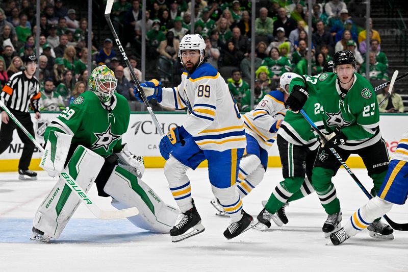 Apr 9, 2024; Dallas, Texas, USA; Buffalo Sabres right wing Alex Tuch (89) and Dallas Stars goaltender Jake Oettinger (29) and defenseman Esa Lindell (23) look for the puck in the Stars zone during the first period at the American Airlines Center. Mandatory Credit: Jerome Miron-USA TODAY Sports