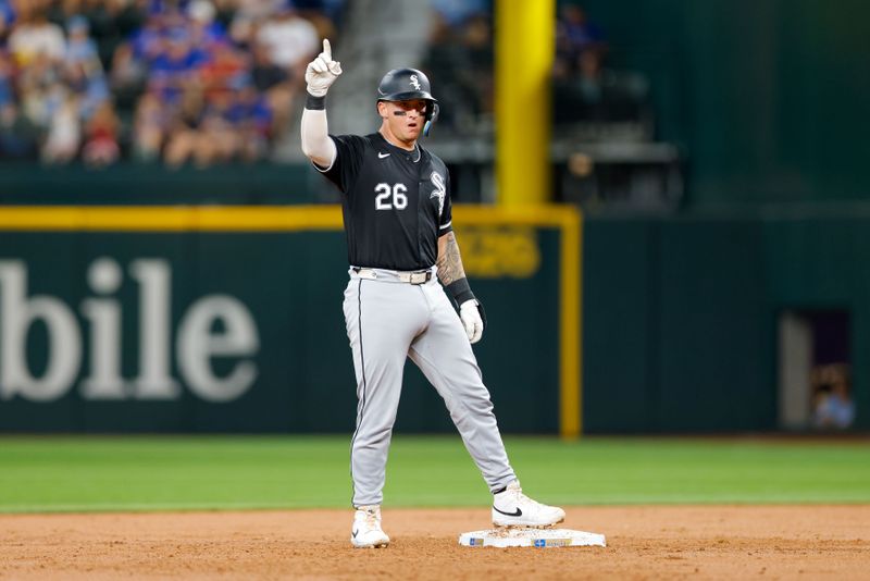 Jul 23, 2024; Arlington, Texas, USA; Chicago White Sox catcher Korey Lee (26) doubles during the third inning against the Texas Rangers at Globe Life Field. Mandatory Credit: Andrew Dieb-USA TODAY Sports