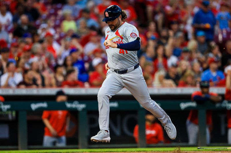 Aug 14, 2024; Cincinnati, Ohio, USA; St. Louis Cardinals designated hitter Alec Burleson (41) scores on a single hit by third baseman Nolan Arenado (not pictured) in the sixth inning against the Cincinnati Reds at Great American Ball Park. Mandatory Credit: Katie Stratman-USA TODAY Sports