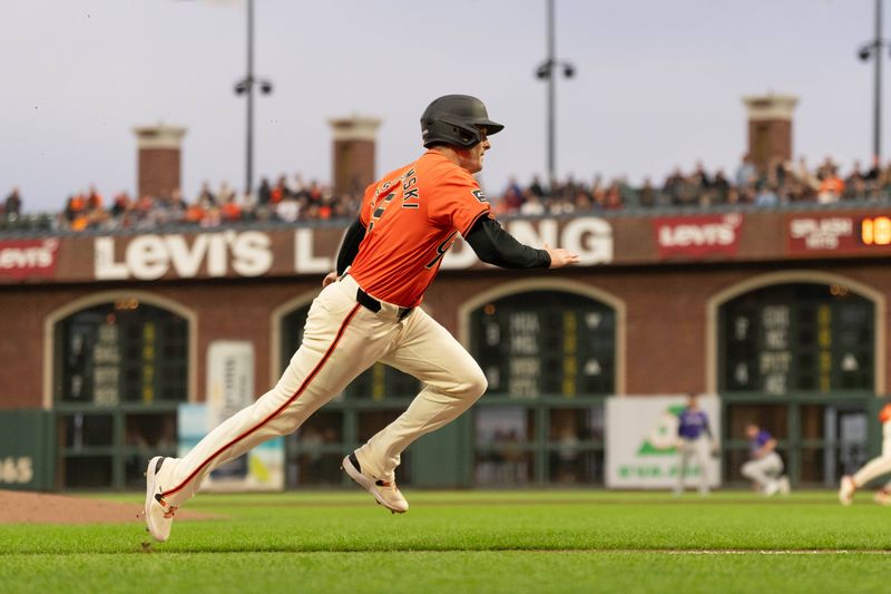 Jul 26, 2024; San Francisco, California, USA;  San Francisco Giants outfielder Mike Yastrzemski (5) runs towards home plate during the second inning against the Colorado Rockies at Oracle Park. Mandatory Credit: Stan Szeto-USA TODAY Sports