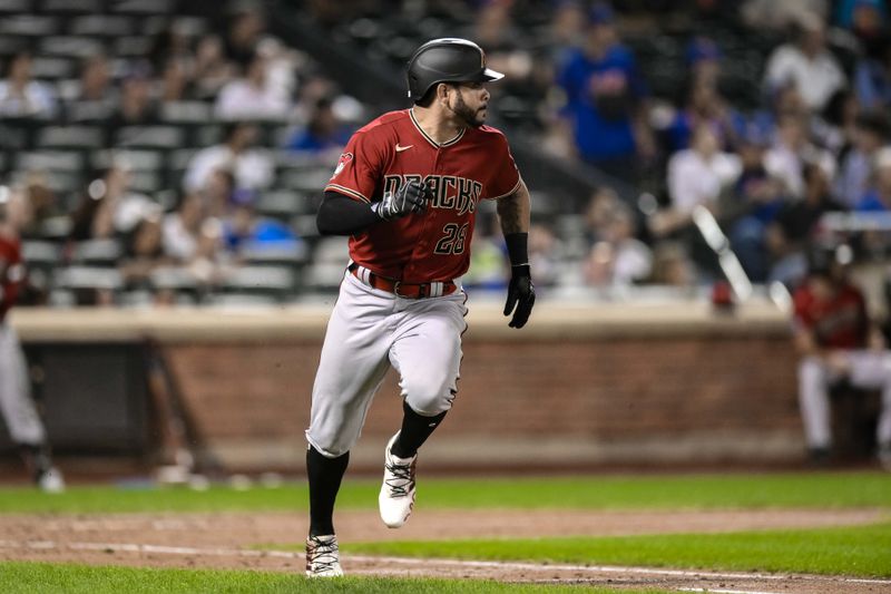 Sep 11, 2023; New York City, New York, USA; Arizona Diamondbacks left fielder Tommy Pham (28) heads to first base after hitting a single against the New York Mets during the fifth inning at Citi Field. Mandatory Credit: John Jones-USA TODAY Sports