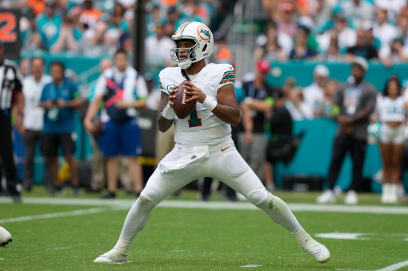 Miami Dolphins quarterback Tua Tagovailoa looks to pass during the second half of an NFL football game against the New England Patriots, Sunday, Oct. 29, 2023, in Miami Gardens, Fla. (AP Photo/Lynne Sladky)