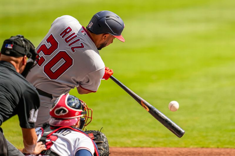 Oct 1, 2023; Cumberland, Georgia, USA; Washington Nationals designated hitter Keibert Ruiz (20) hits a ground rule double to drive in two runs against the Atlanta Braves during the first inning at Truist Park. Mandatory Credit: Dale Zanine-USA TODAY Sports