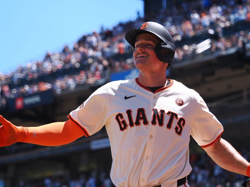 Jun 30, 2024; San Francisco, California, USA; San Francisco Giants third baseman Matt Chapman (26) high fives teammates after hitting a two-run home run against the Los Angeles Dodgers during the fourth inning at Oracle Park. Mandatory Credit: Kelley L Cox-USA TODAY Sports