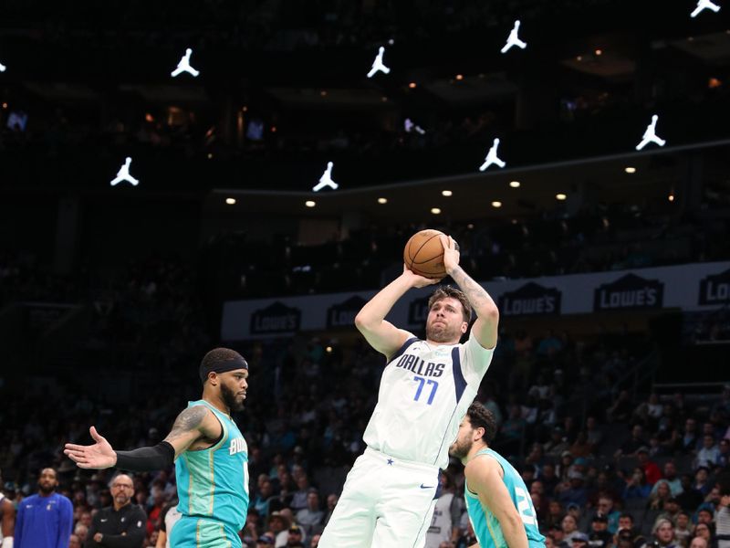 CHARLOTTE, NC - APRIL 9: Luka Doncic #77 of the Dallas Mavericks shoots the ball during the game against the Charlotte Hornets on April 9, 2024 at Spectrum Center in Charlotte, North Carolina. NOTE TO USER: User expressly acknowledges and agrees that, by downloading and or using this photograph, User is consenting to the terms and conditions of the Getty Images License Agreement. Mandatory Copyright Notice: Copyright 2024 NBAE (Photo by Brock Williams-Smith/NBAE via Getty Images)