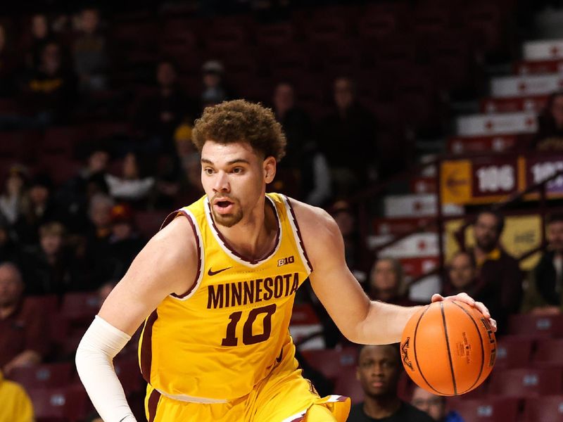 Dec 22, 2022; Minneapolis, Minnesota, USA; Minnesota Golden Gophers forward Jamison Battle (10) dribbles the ball against the Chicago State Cougars during the first half at Williams Arena. Mandatory Credit: Matt Krohn-USA TODAY Sports