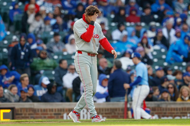 Apr 25, 2025; Chicago, Illinois, USA; Philadelphia Phillies shortstop Trea Turner (7) reacts after striking out against the Chicago Cubs during the fifth inning at Wrigley Field. Mandatory Credit: Kamil Krzaczynski-Imagn Images
