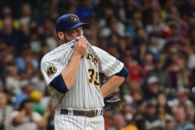 Sep 16, 2023; Milwaukee, Wisconsin, USA; Milwaukee Brewers pitcher Corbin Burnes (39) reacts after walking Washington Nationals second baseman Luis Garcia (not pictured) with the bases loaded to force in a run in the sixth inning at American Family Field. Mandatory Credit: Benny Sieu-USA TODAY Sports