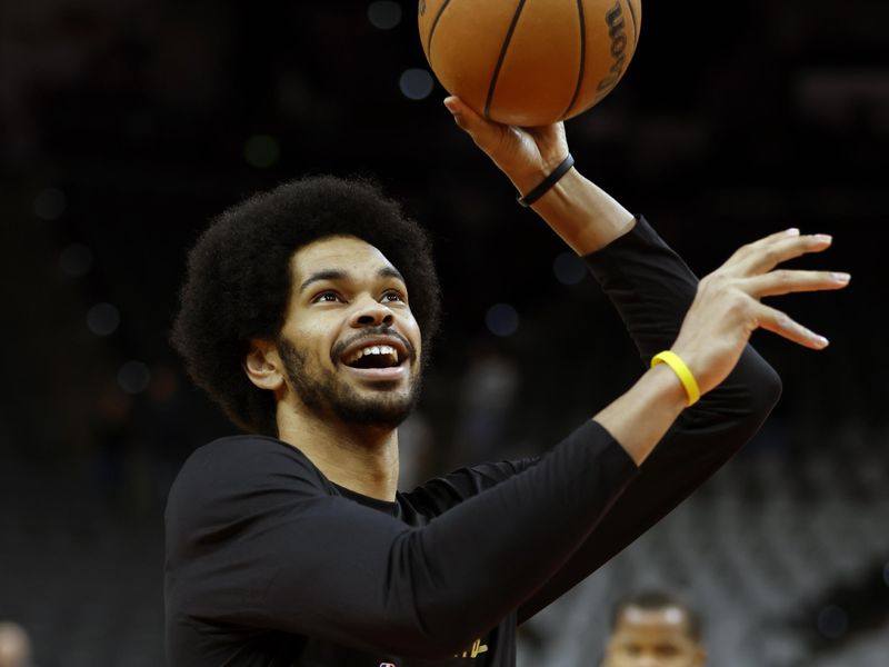 SAN ANTONIO, TX - FEBRUARY 03: Jarrett Allen #31 of the Cleveland Cavaliers takes warm up shots before their game against the San Antonio Spurs at Frost Bank Center on February 3, 2024 in San Antonio, Texas. NOTE TO USER: User expressly acknowledges and agrees that, by downloading and or using this photograph, User is consenting to terms and conditions of the Getty Images License Agreement. (Photo by Ronald Cortes/Getty Images)