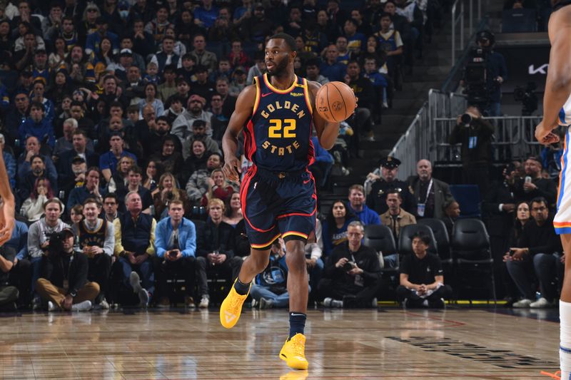 SAN FRANCISCO, CA - NOVEMBER 27: Andrew Wiggins #22 of the Golden State Warriors dribbles the ball during the game against the Oklahoma City Thunder on November 27, 2024 at Chase Center in San Francisco, California. NOTE TO USER: User expressly acknowledges and agrees that, by downloading and or using this photograph, user is consenting to the terms and conditions of Getty Images License Agreement. Mandatory Copyright Notice: Copyright 2024 NBAE (Photo by Noah Graham/NBAE via Getty Images)