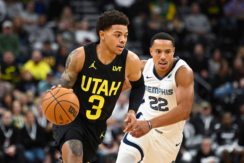 SALT LAKE CITY, UTAH - OCTOBER 23: Keyonte George #3 of the Utah Jazz drives against Desmond Bane #22 of the Memphis Grizzlies during the first quarter at Delta Center on October 23, 2024 in Salt Lake City, Utah. NOTE TO USER: User expressly acknowledges and agrees that, by downloading and or using this photograph, User is consenting to the terms and conditions of the Getty Images License Agreement. (Photo by Alex Goodlett/Getty Images)