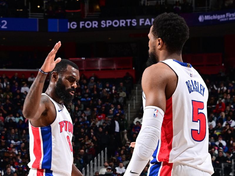 DETROIT, MI - JANUARY 1: Tim Hardaway Jr. #8 and Malik Beasley #5 of the Detroit Pistons high five during the game against the Orlando Magic on January 1, 2025 at Little Caesars Arena in Detroit, Michigan. NOTE TO USER: User expressly acknowledges and agrees that, by downloading and/or using this photograph, User is consenting to the terms and conditions of the Getty Images License Agreement. Mandatory Copyright Notice: Copyright 2025 NBAE (Photo by Chris Schwegler/NBAE via Getty Images)