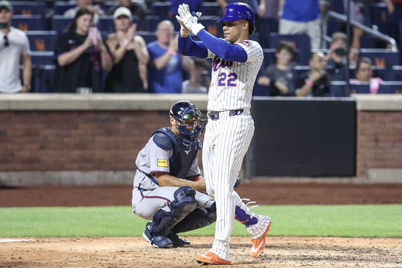 Jun 25, 2025; New York City, New York, USA;  New York Mets right fielder Juan Soto (22) gestures after hitting a solo home run in the seventh inning against the Atlanta Braves at Citi Field. Mandatory Credit: Wendell Cruz-Imagn Images