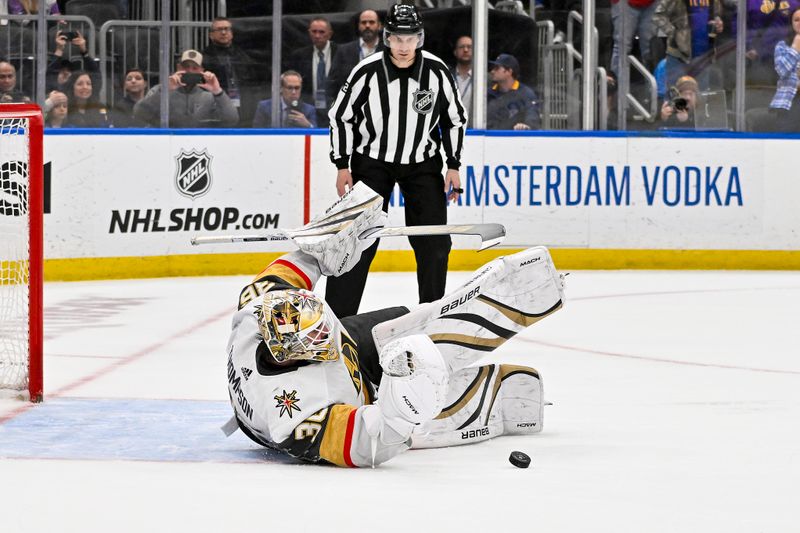 Mar 25, 2024; St. Louis, Missouri, USA;  Vegas Golden Knights goaltender Logan Thompson (36) makes a save on a penalty shot by St. Louis Blues left wing Pavel Buchnevich (not pictured) in overtime at Enterprise Center. Mandatory Credit: Jeff Curry-USA TODAY Sports