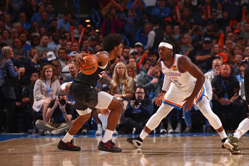 OKLAHOMA CITY, OK - NOVEMBER 20: Scoot Henderson #00 of the Portland Trail Blazers dribbles the ball during the game against the Oklahoma City Thunder on November 20, 2024 at Paycom Center in Oklahoma City, Oklahoma. NOTE TO USER: User expressly acknowledges and agrees that, by downloading and or using this photograph, User is consenting to the terms and conditions of the Getty Images License Agreement. Mandatory Copyright Notice: Copyright 2024 NBAE (Photo by Zach Beeker/NBAE via Getty Images)