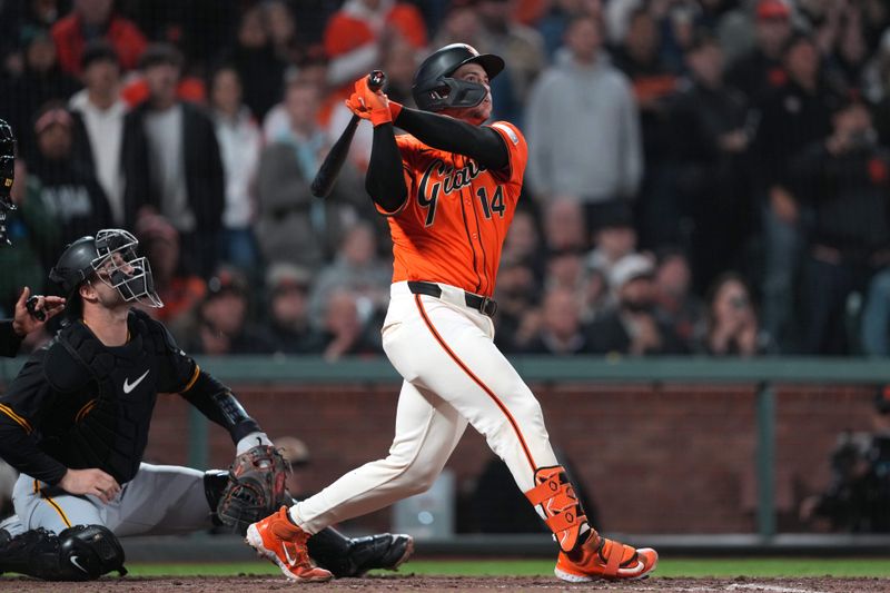 Apr 26, 2024; San Francisco, California, USA; San Francisco Giants catcher Patrick Bailey (14) hits a walk-off home run against the Pittsburgh Pirates during the ninth inning at Oracle Park. Mandatory Credit: Darren Yamashita-USA TODAY Sports