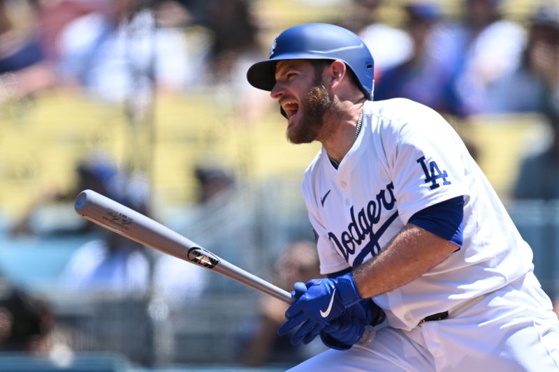 Apr 21, 2024; Los Angeles, California, USA; Los Angeles Dodgers third baseman Max Muncy (13) reacts to a foul ball against the New York Mets during the second inning at Dodger Stadium. Mandatory Credit: Jonathan Hui-USA TODAY Sports