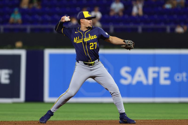 May 20, 2024; Miami, Florida, USA; Milwaukee Brewers shortstop Willy Adames (27) throws to first base against the Milwaukee Brewers during the first inning at loanDepot Park. Mandatory Credit: Sam Navarro-USA TODAY Sports