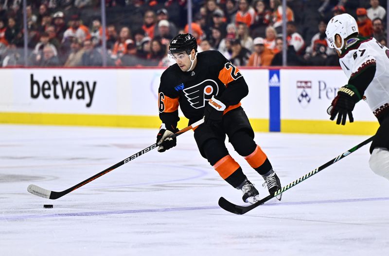 Feb 12, 2024; Philadelphia, Pennsylvania, USA; Philadelphia Flyers defenseman Sean Walker (26) controls the puck against the Arizona Coyotes in the first period at Wells Fargo Center. Mandatory Credit: Kyle Ross-USA TODAY Sports